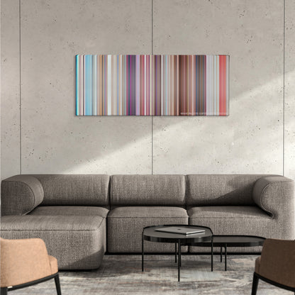 Minions color palette canvas on a concrete wall above a gray sectional sofa