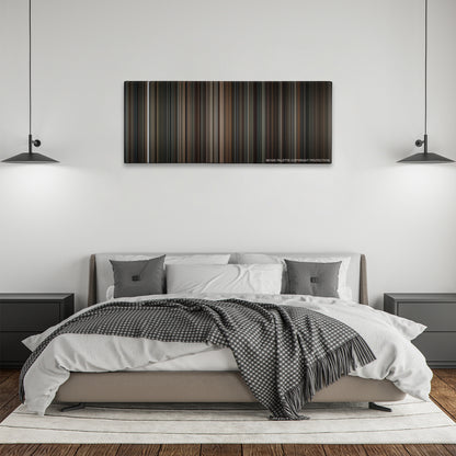 American Gangster color palette canvas above a bed, between two black pendant lamps
