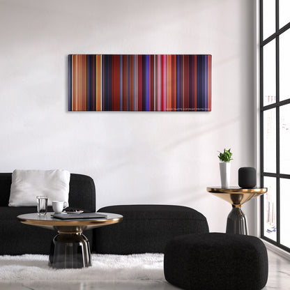 Beauty and the Beast color palette canvas above a black sofa with a gold-topped table