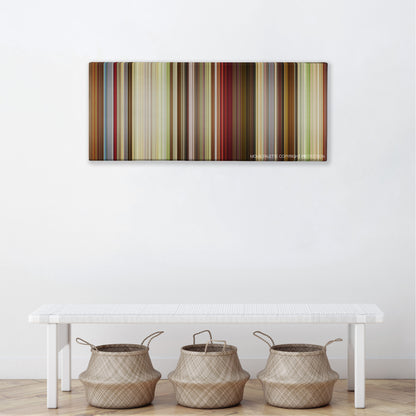 That's My Boy color palette canvas above a white bench with three woven baskets