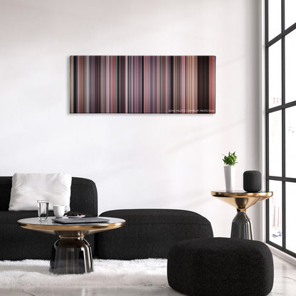 Cellular color palette canvas above a black sofa with a gold-topped table