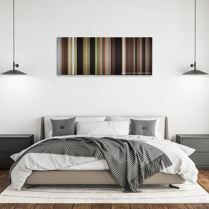 Crocodile Dundee color palette canvas above a bed, between two black pendant lamps