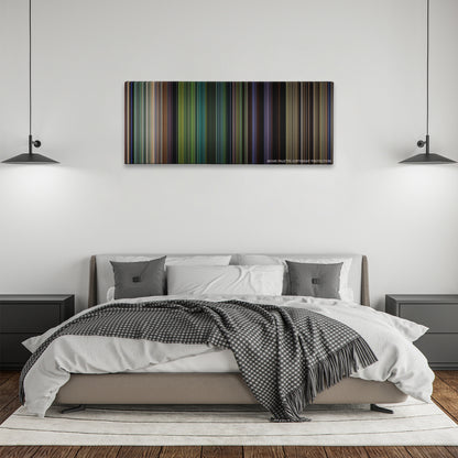 Tropic Thunder color palette canvas above a bed, between two black pendant lamps