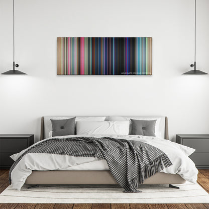 Good Time color palette canvas above a bed, between two black pendant lamps