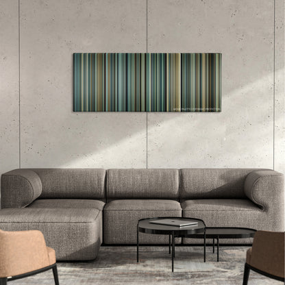 A Prophet color palette canvas on a concrete wall above a gray sectional sofa