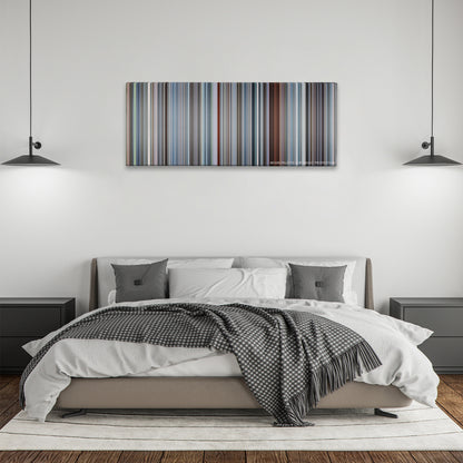 The Big Short color palette canvas above a bed, between two black pendant lamps