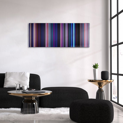 Frozen II color palette canvas above a black sofa with a gold-topped table
