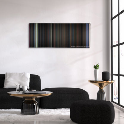 Evil Dead II color palette canvas above a black sofa with a gold-topped table