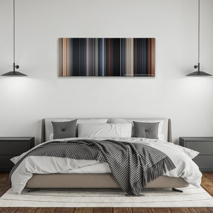 Fast & Furious 6 color palette canvas above a bed, between two black pendant lamps