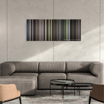 The Cider House Rules color palette canvas on a concrete wall above a gray sectional sofa