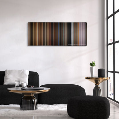 Bohemian Rhapsody color palette canvas above a black sofa with a gold-topped table