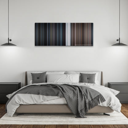 Room color palette canvas above a bed, between two black pendant lamps