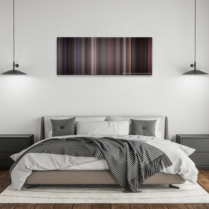 American Pie color palette canvas above a bed, between two black pendant lamps