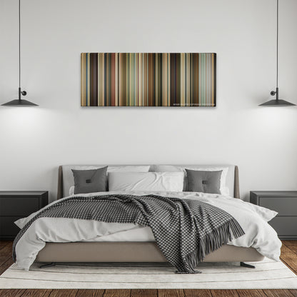 Knocked Up color palette canvas above a bed, between two black pendant lamps