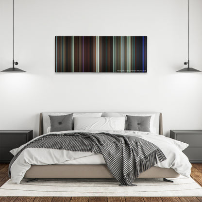 The Guest color palette canvas above a bed, between two black pendant lamps
