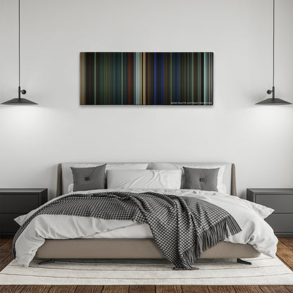 Collateral color palette canvas above a bed, between two black pendant lamps