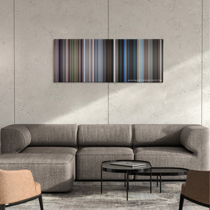 For Your Eyes Only color palette canvas on a concrete wall above a gray sectional sofa
