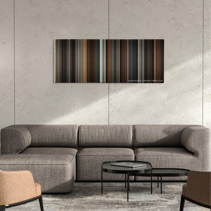 Fifty Shades Darker color palette canvas on a concrete wall above a gray sectional sofa