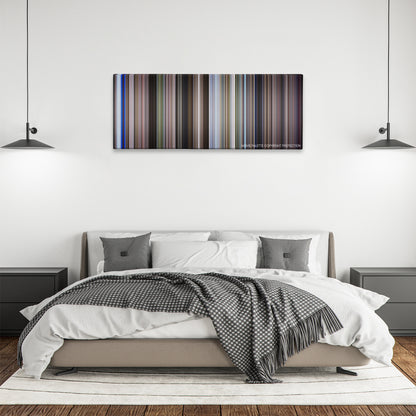 Moonraker color palette canvas above a bed, between two black pendant lamps