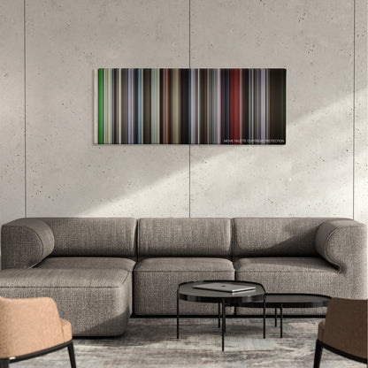 Paris, Texas color palette canvas on a concrete wall above a gray sectional sofa