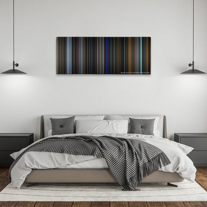 The Game color palette canvas above a bed, between two black pendant lamps