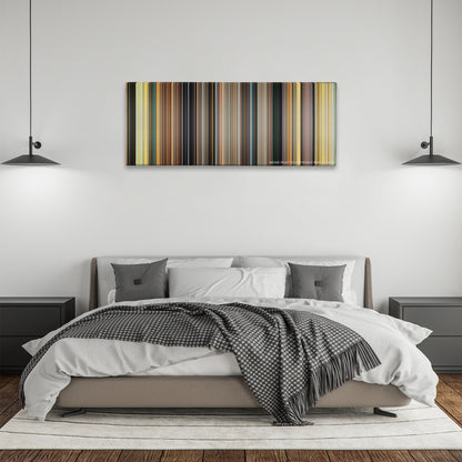 127 Hours color palette canvas above a bed, between two black pendant lamps