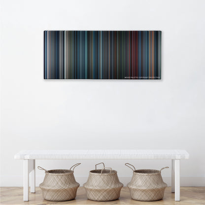 Aliens color palette canvas above a white bench with three woven baskets
