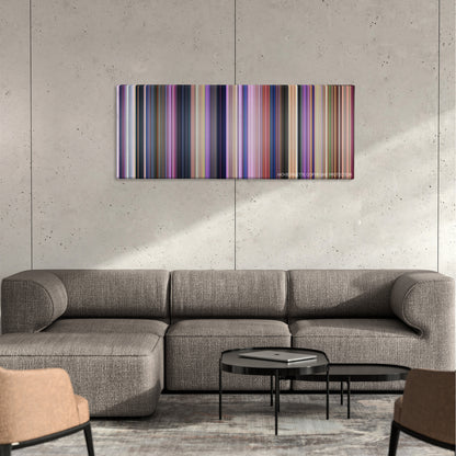 Home color palette canvas on a concrete wall above a gray sectional sofa