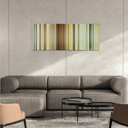 Hell or High Water color palette canvas on a concrete wall above a gray sectional sofa