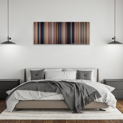Hotel Rwanda color palette canvas above a bed, between two black pendant lamps