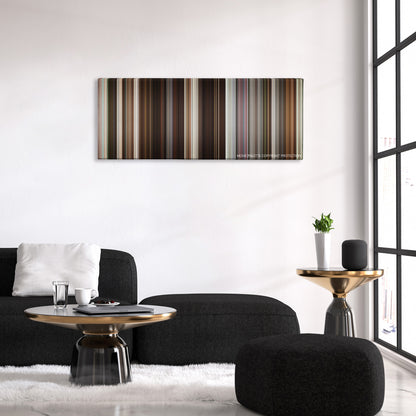 Collateral Beauty color palette canvas above a black sofa with a gold-topped table