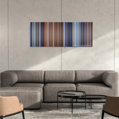 Die Another Day color palette canvas on a concrete wall above a gray sectional sofa
