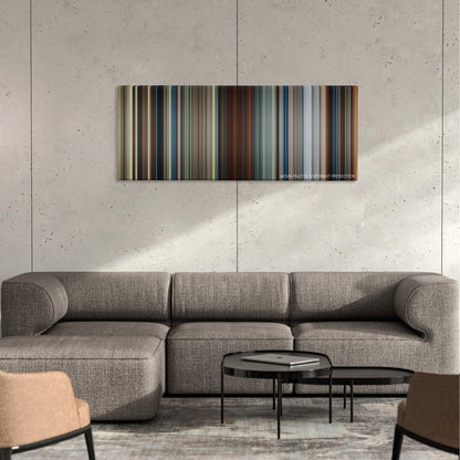 Sonic the Hedgehog color palette canvas on a concrete wall above a gray sectional sofa