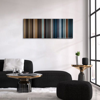 The Golden Compass color palette canvas above a black sofa with a gold-topped table