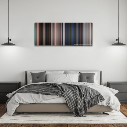 Mission: Impossible II color palette canvas above a bed, between two black pendant lamps