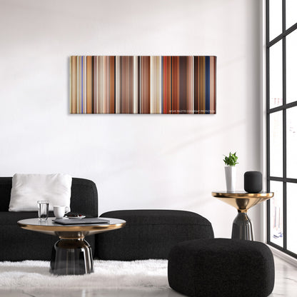 Intolerable Cruelty color palette canvas above a black sofa with a gold-topped table