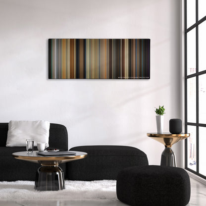 Get Out color palette canvas above a black sofa with a gold-topped table