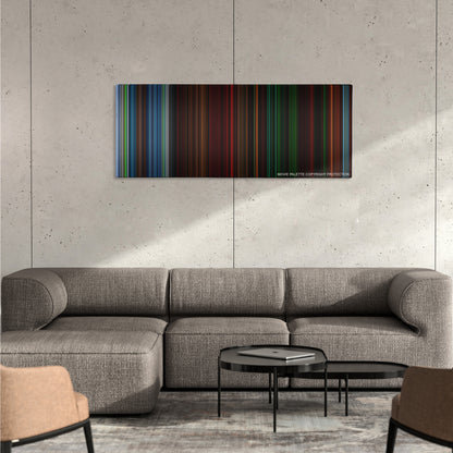 The Descent color palette canvas on a concrete wall above a gray sectional sofa