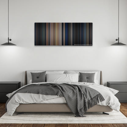The Expendables color palette canvas above a bed, between two black pendant lamps