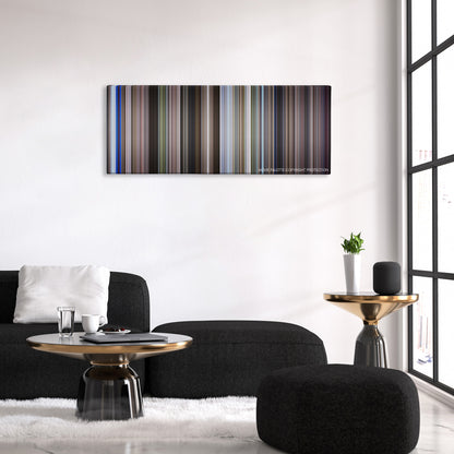 Moonraker color palette canvas above a black sofa with a gold-topped table