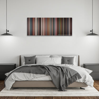 Fantastic Four color palette canvas above a bed, between two black pendant lamps
