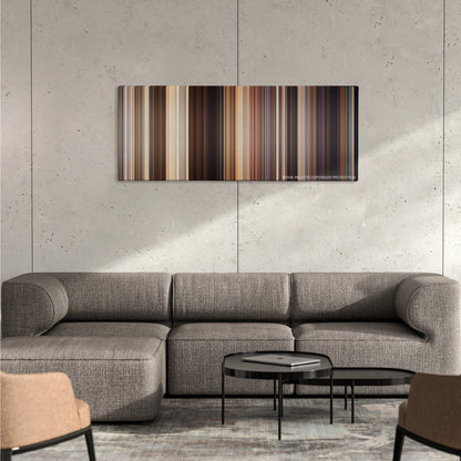American Reunion color palette canvas on a concrete wall above a gray sectional sofa