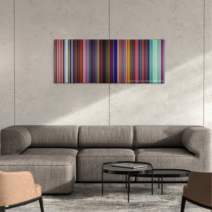 Cloudy with a Chance of Meatballs 2 color palette canvas on a concrete wall above a gray sectional sofa