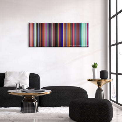 Cloudy with a Chance of Meatballs 2 color palette canvas above a black sofa with a gold-topped table