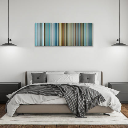 The Island color palette canvas above a bed, between two black pendant lamps