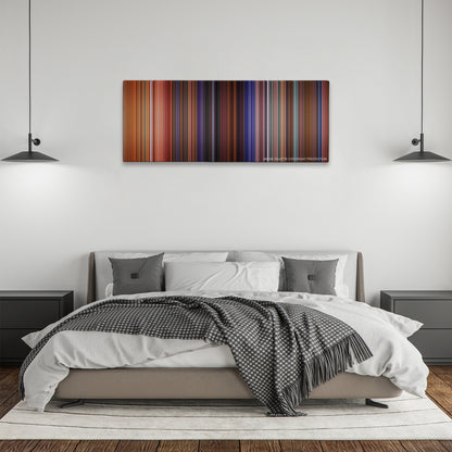 Eyes Wide Shut color palette canvas above a bed, between two black pendant lamps