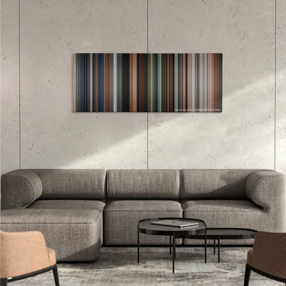 Get Smart color palette canvas on a concrete wall above a gray sectional sofa