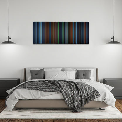 Hellboy color palette canvas above a bed, between two black pendant lamps