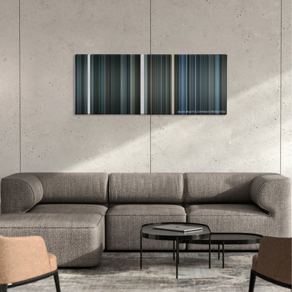 Iron Sky color palette canvas on a concrete wall above a gray sectional sofa