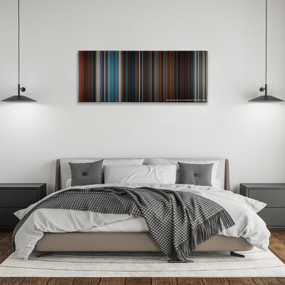 The Interview color palette canvas above a bed, between two black pendant lamps